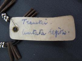 Rectangular parchment label tied to object (view 2)