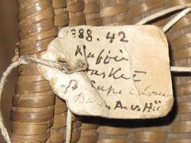 Parchment label tied to object