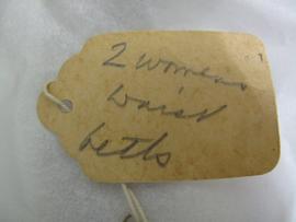 Small paper label tied to object