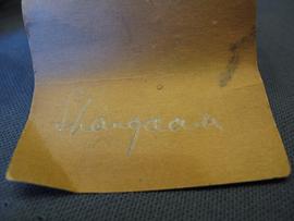 Brown paper label (view 4)